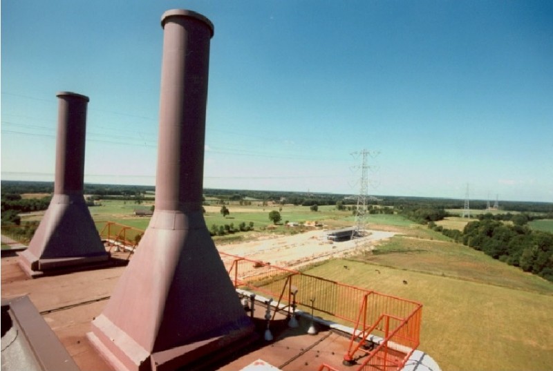 Staalsteden juli 1990 De warmtekrachtcentrale met een kijk over de Staalsteden waar het staalconstructiebedrijf Goedhart en Woolderik in aanbouw..jpg