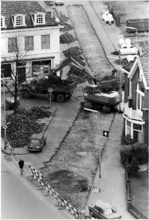 Oldenzaalsestraat 132-136 met Minkmaatstraat in onderhoud met op de achtergrond Jassies Apotheek..jpg