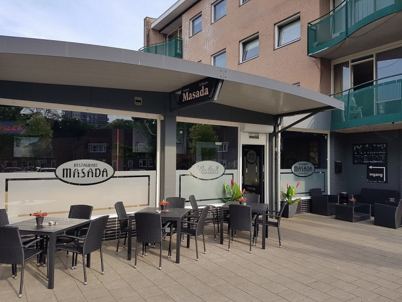 Wethouder Gerbertstraat 61 terras pizza-grillrestaurant Masada Boswinkel vroeger pand keurslager Achterberg.jpg